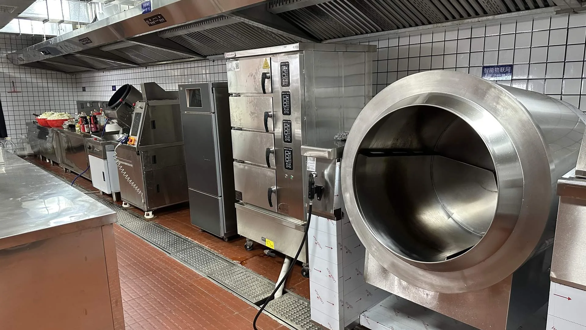 Commercial smart kitchen with drum wok cooker and rice steamer installation